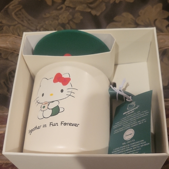 SanrioStarbucks Hello Kitty Cream Mug with Green Lid Bagged Boxed Free Gift